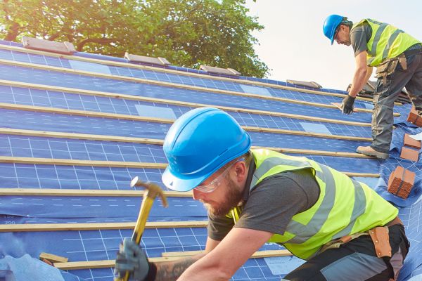 Roofers Installing A Brand New Roof